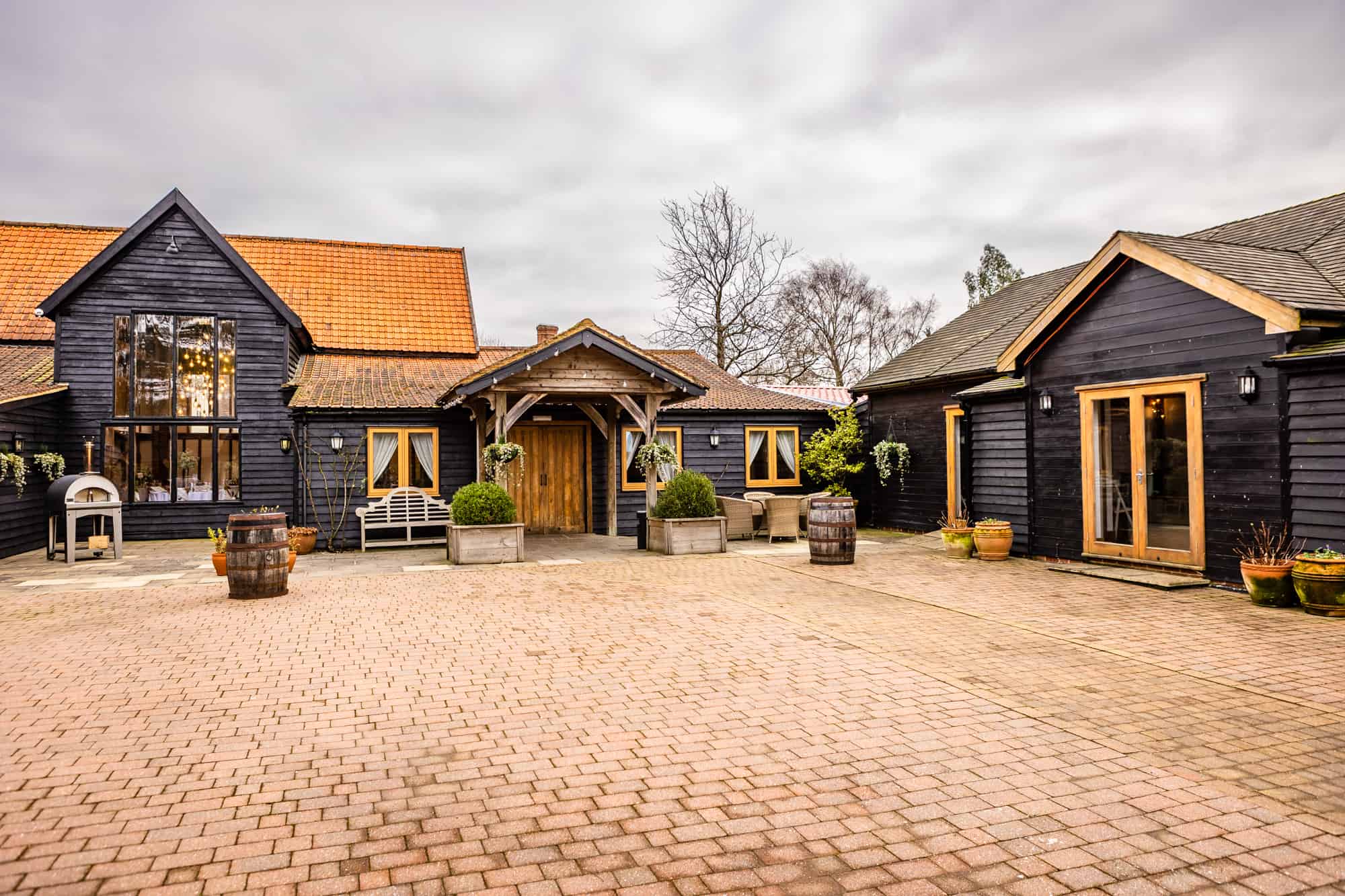  A wide-angle shot of the courtyard at Maidens Barn