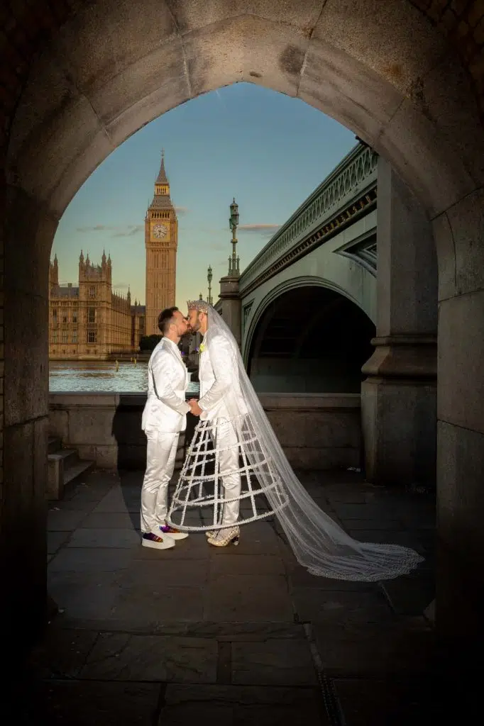 London elopement photographer, two grooms kissing with Big Ben in the background