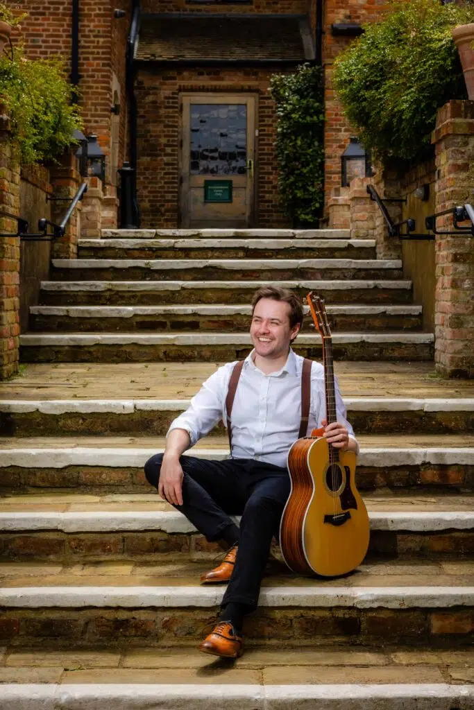 Joe Bailey o nthe steps at Old Hall Ely