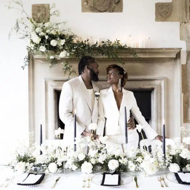 butley priory wedding photographer image of couple at wedding breakfast table