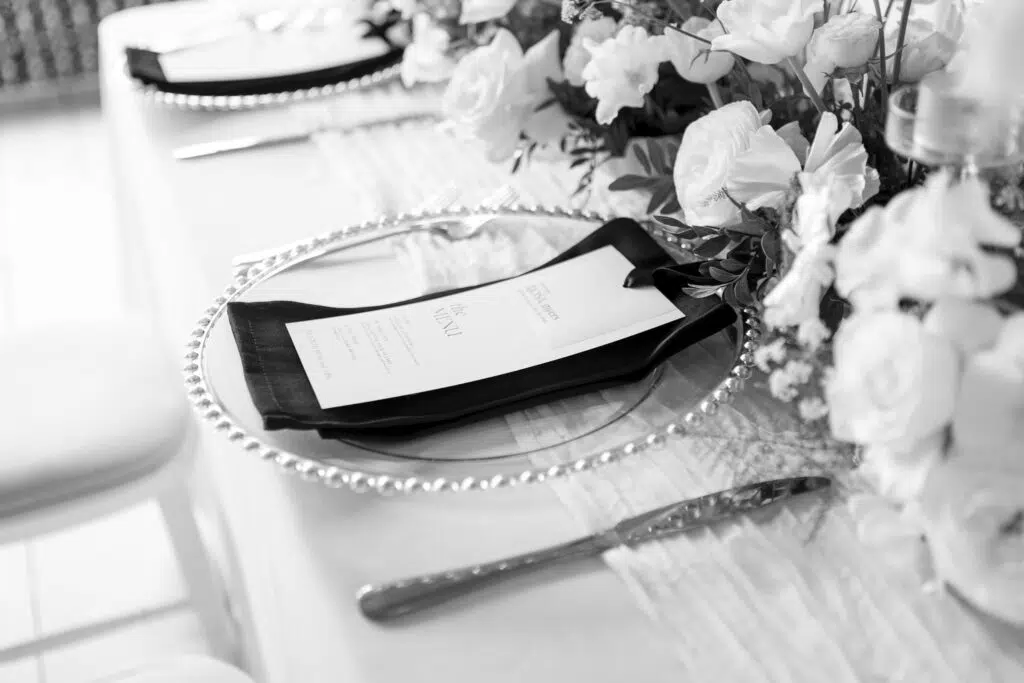 luxury wedding tablescape at Butley Priory wedding venue Suffolk in black and white