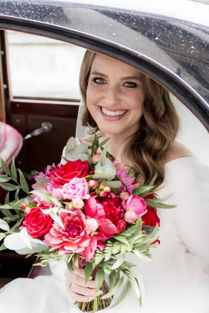 A bridal portrait in the wedding car at the law society