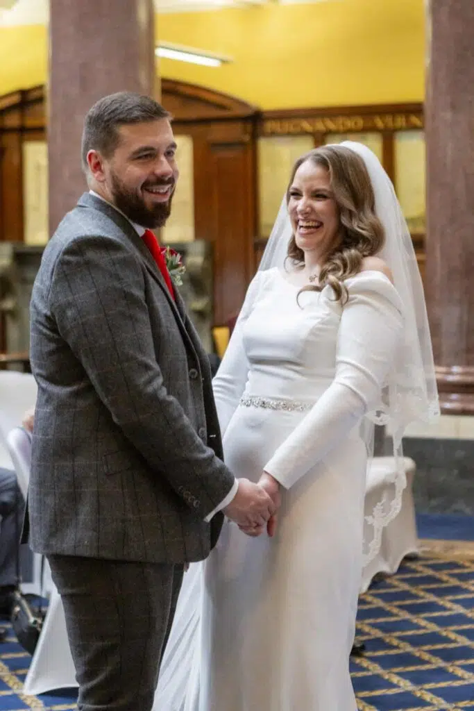 Couple laughing during their Law Society wedding reception