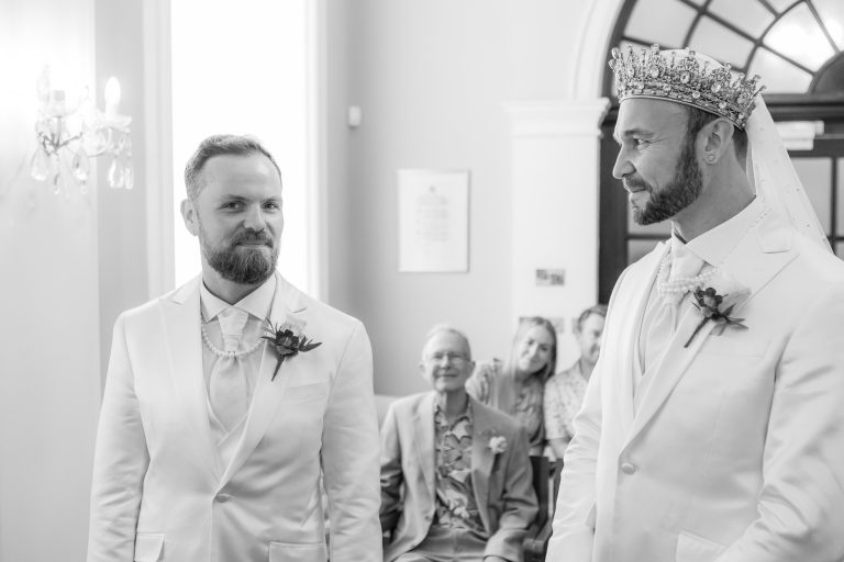 Pete and Will exchanging vows during their wedding ceremony at Chelsea Old Town Hall.
